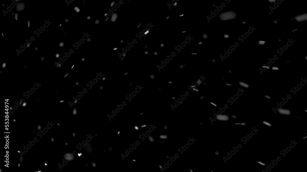 Snow is snowing towards camera in black background