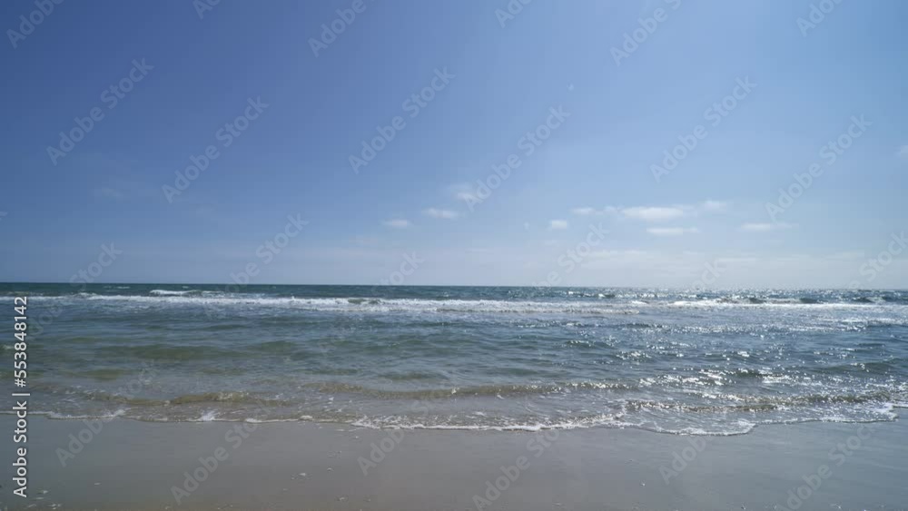 little waves on the beach Espiguette France sunny day static shot little waves on the beach Espiguette France sunny day static shot