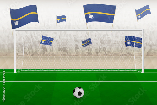 Nauru football team fans with flags of Nauru cheering on stadium, penalty kick concept in a soccer match.