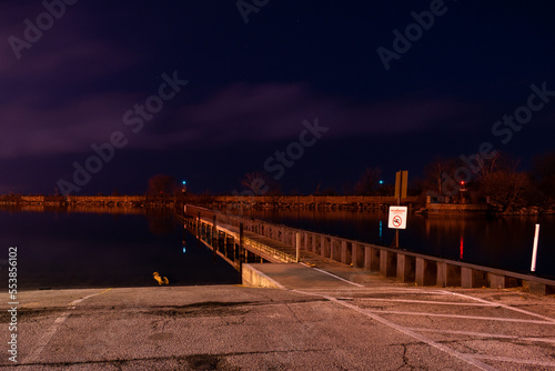 Dock with boat ramps at night long exposure.