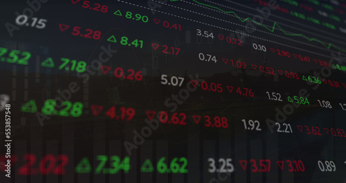 Image of scope scanning with computer icon over stock market on black background