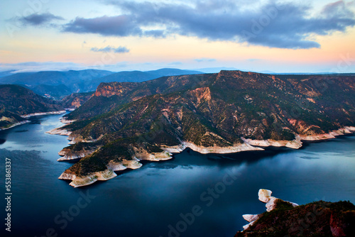 dam in the morning at blue hour, mountains with desertic vegetation, zimapan hidalgo  photo