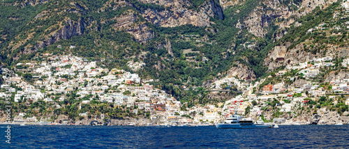 Summer panorama of Positano along the Amalfi coast, seen from the sea in front of the town © Marco