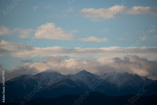Clouds over the snowy mountains 2