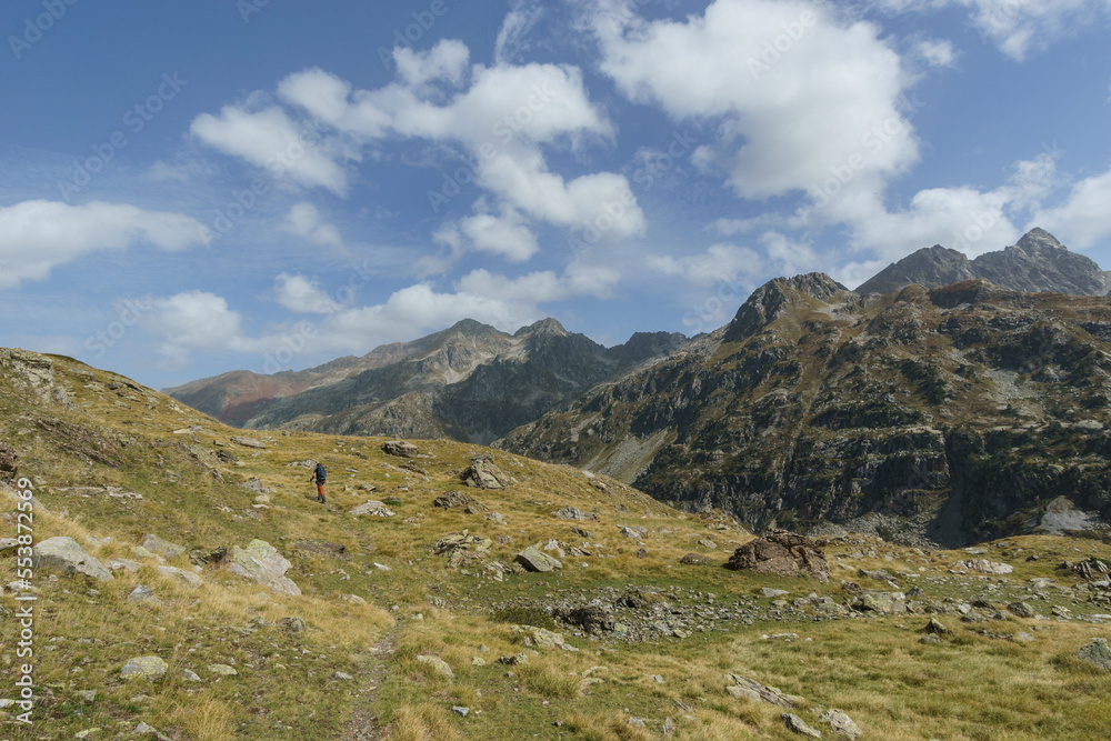 Beautiful pyrenees mountain landscape of Vallee du Soussoueou with hiking footpath on a beautiful autumn day, Artouste, Nouvelle-Aquitaine, France