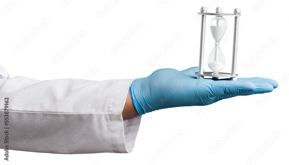 Doctors hands holding hourglass clock Doctors hands holding hourglass clock
