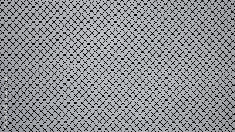 gray background, in the photo a metal mesh chain link on a gray sky background close-up