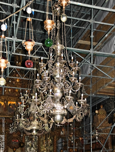 Chandelier and view of the iconostasis during reconstruction, Holy Church of the Nativity of Christ; Bethlehem, Palestine, Israel. The church marks the place where Jesus was born (Luke 2:7) photo