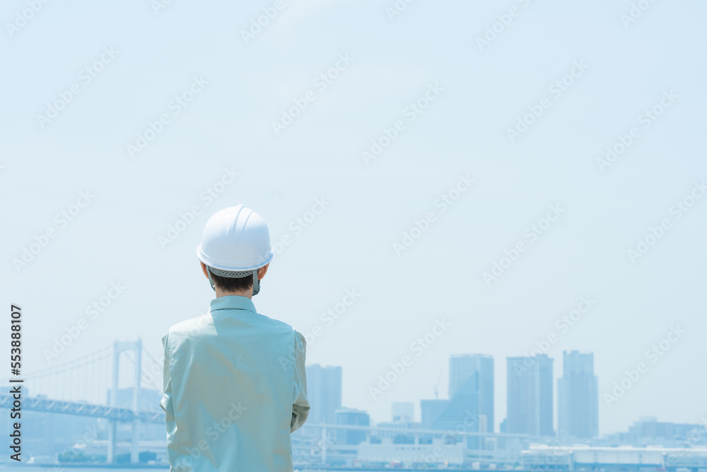 都会で働く作業員（作業服・作業着・スタッフ・建築・建設・仕事）