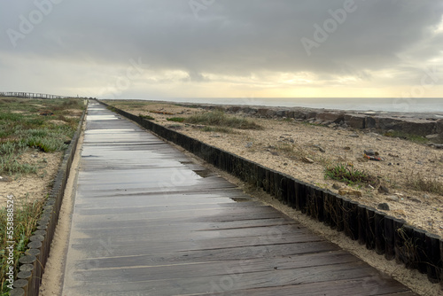 Storm at sea seen from the wooden walkway