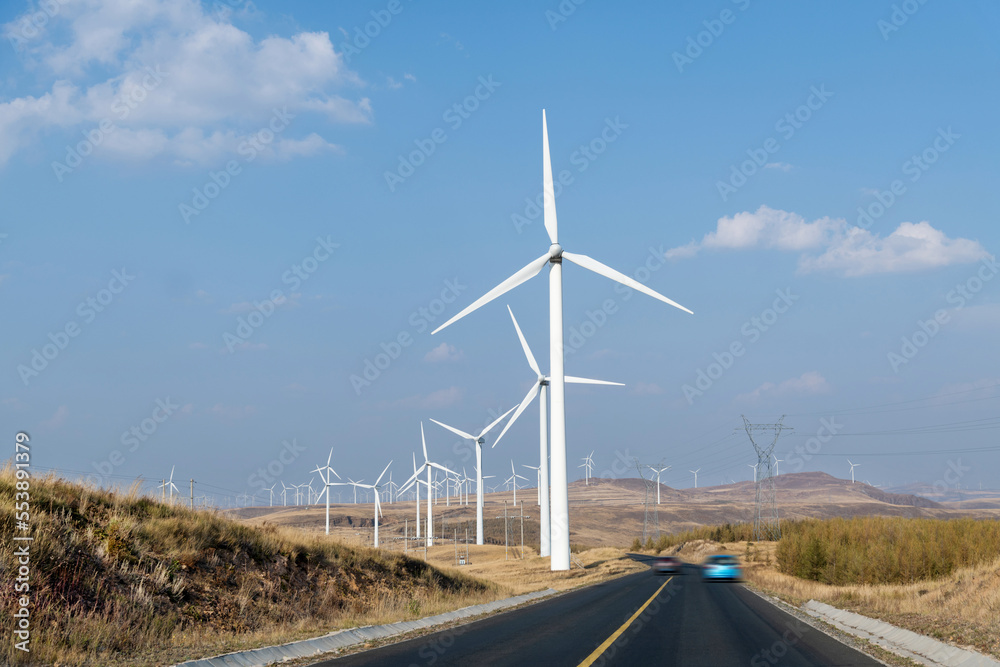 Landscape of highway and windmills