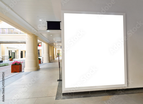 Blank billboard in modern shopping mall