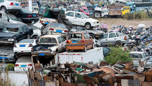 A pile of abandoned cars on junkyard © xy