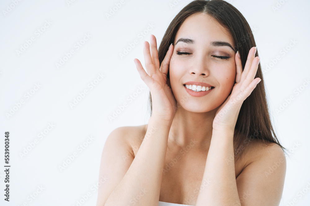 Beauty portrait of young asian woman with healthy dark long hair on white background isolated Beauty portrait of young asian woman with healthy dark long hair on white background isolated