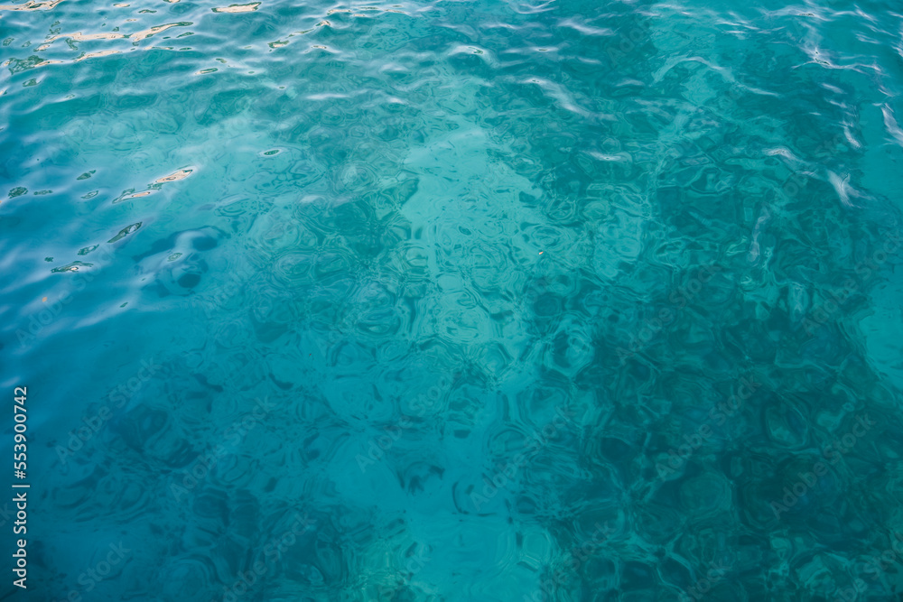 Tropical bright aqua ocean texture in Jamaica, Negril - resort vibes