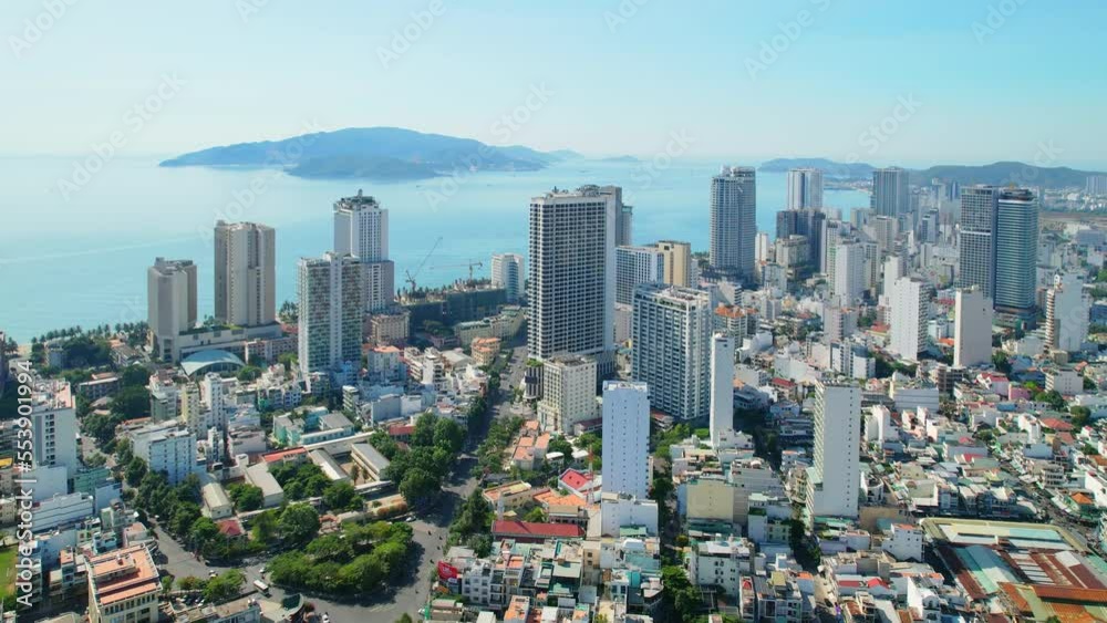 The coastal city of Nha Trang seen from above on a sunny summer afternoon. This is a famous city for cultural tourism in central Vietnam The coastal city of Nha Trang seen from above on a sunny summer afternoon. This is a famous city for cultural tourism in central Vietnam