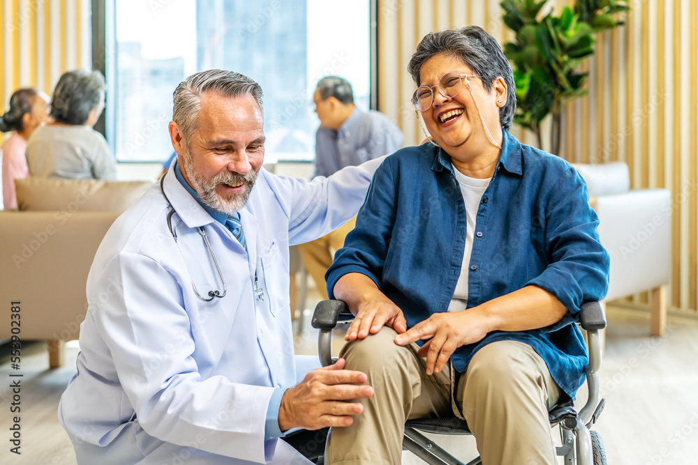 Orthopedist examines the knee of elderly patient to collect information for physical therapy treated. Doctor touch knee pain area of Old woman legs talking about knee pain symptom. Orthopedist examines the knee of elderly patient to collect information for physical therapy treated. Doctor touch knee pain area of Old woman legs talking about knee pain symptom.