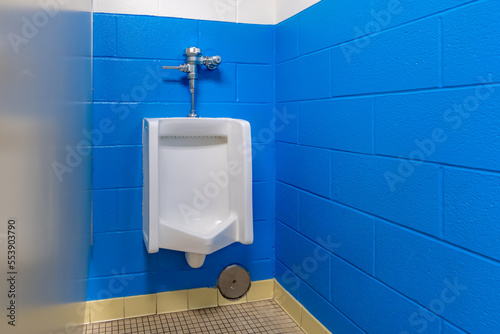 white urinal in men's bathroom
 photo