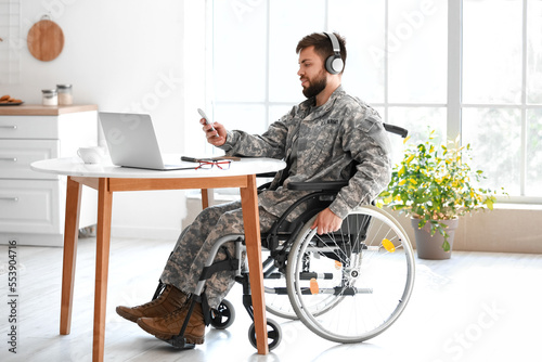 Young soldier in wheelchair...