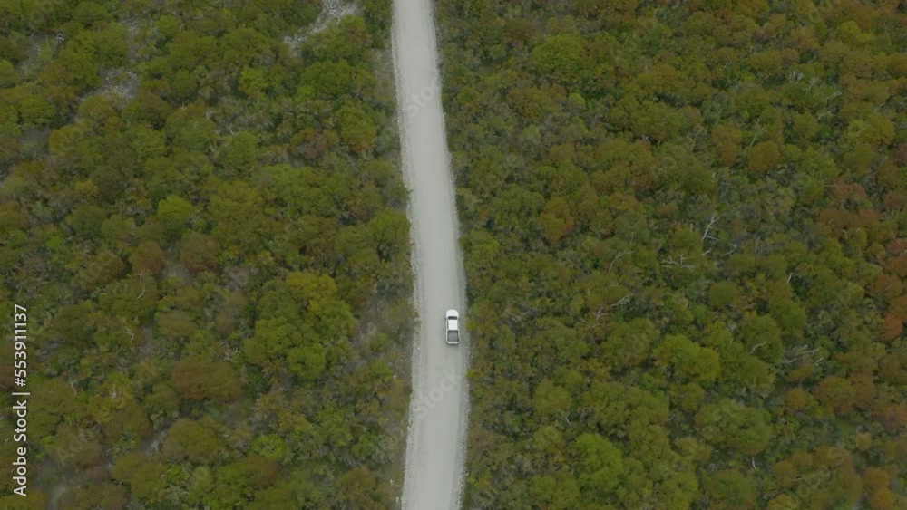 High flying aerial view of a lone truck traveling through the jungles of Argentina High flying aerial view of a lone truck traveling through the jungles of Argentina