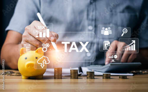 Tax deduction planning concept. Businessman calculating business balance prepare tax reduction. taxes paid by individuals and corporations such as VAT, income tax and property tax