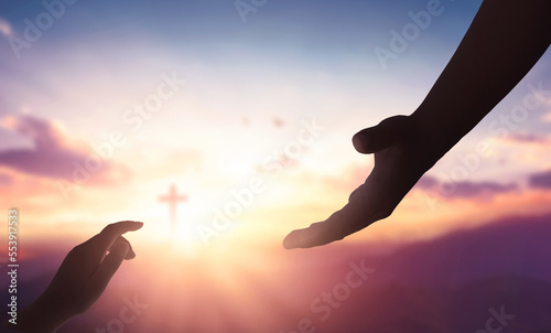 Canvas Print Religion and salvation concept:God reaching out to help people on cross backgrou