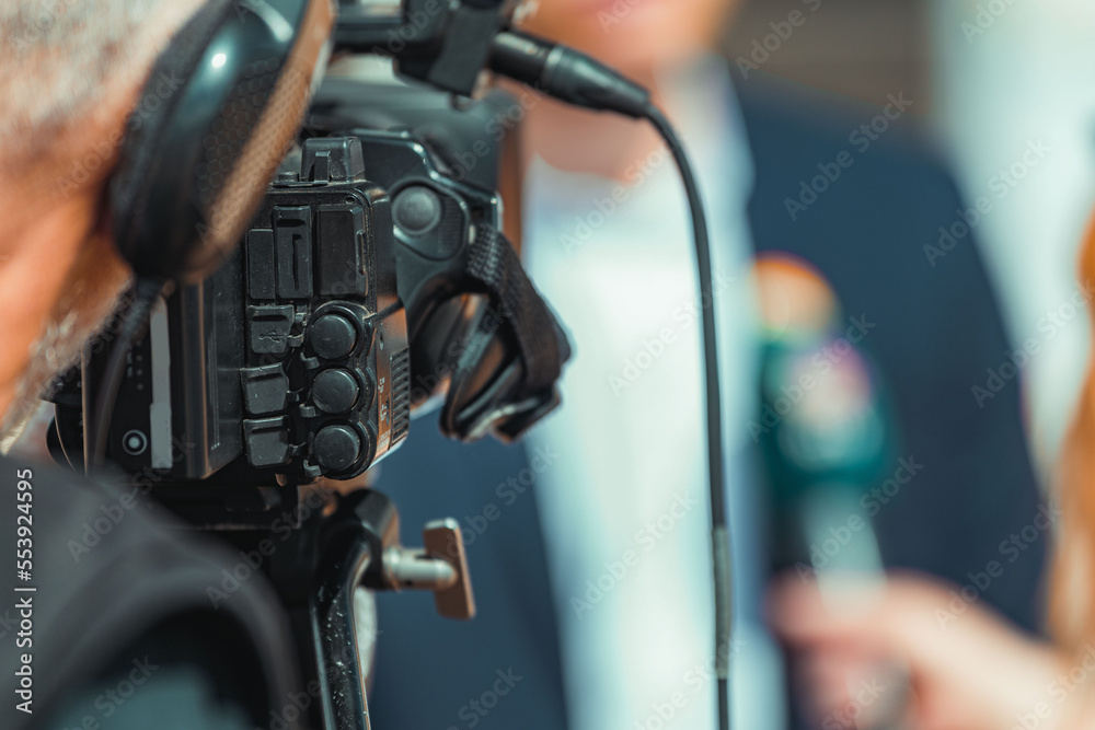 Fototapeta premium Camera at a media press conference publicity outdoors.