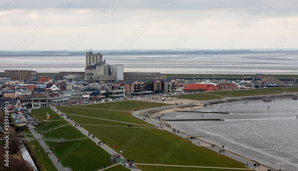 View from the high-rise over the North Sea Bay of Büsum at low tide with mudflat hikers