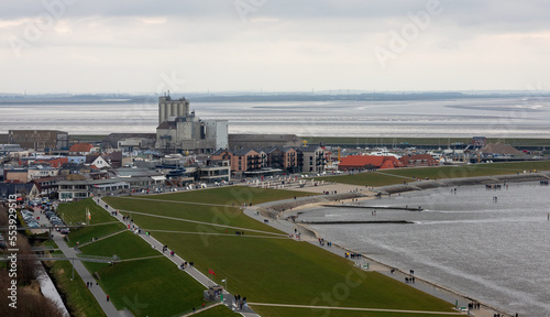 View from the high-rise over the North Sea Bay of Büsum at low tide with mudflat hikers