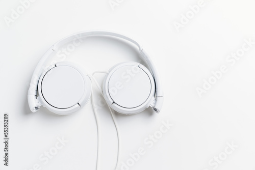 White over-ear headphones on white background. musical equipment. 