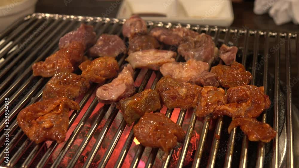 Traditional grilled pork in Seoul, South Korea. Traditional grilled pork in Seoul, South Korea.