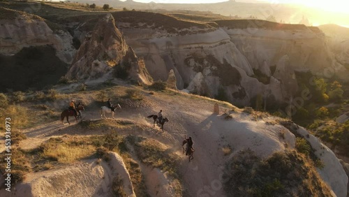 Panoramic view of Cappadocia with people on horse riding