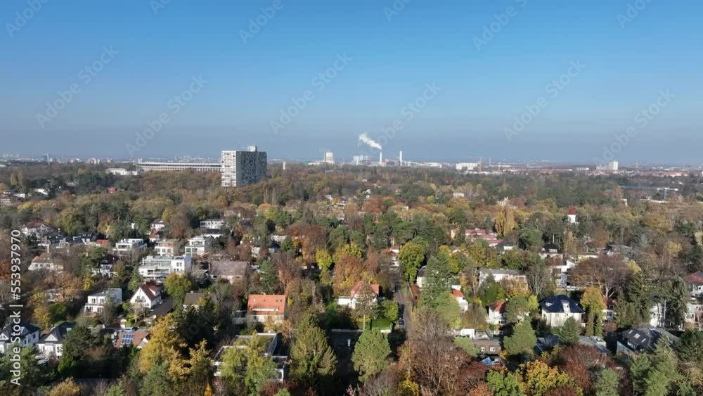 Smoking chimneys of heating Plant Berlin and Olympiastadion, Charlottenburg district in Germany. Sky for copy space. Aerial forward