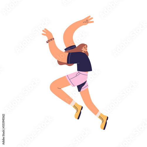Happy active girl jumping. Young carefree woman in funny pose. Energetic joyf...