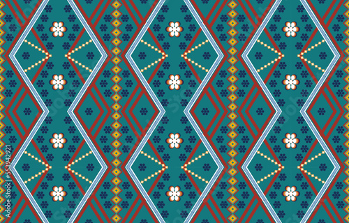 Ikat ethnic seamless pattern design. Aztec fabric 