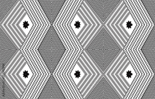 Ikat ethnic seamless pattern design. Aztec fabric 