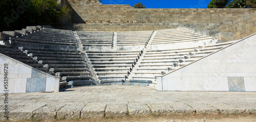 Odeon a classic greek open-air theatre. Old theater with marble seats and stairs. The Acropolis of Rhodes. Monte Smith Hill, Rhodes island, Greece