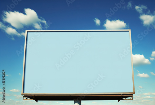 Put your text advertisement on this large, blank billboard with a sky blue background. Generative AI photo