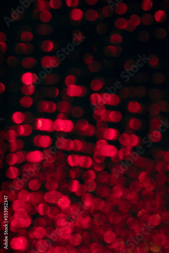 Abstract red blurred  bokeh lights background.