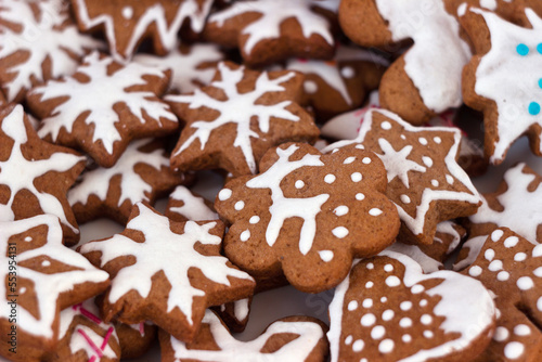 Spicy ginger cookies of different shapes in a plate. Winter New Year's pastries, background