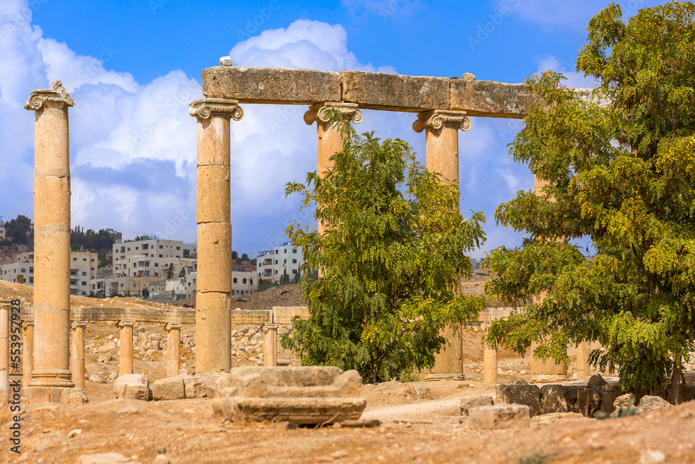 Jerash, Jordan, square with row of columns of Oval Forum Plaza at archaeological site, ruins of Greek and Roman period