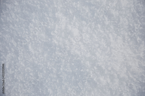 Texture background with white snow, selective focus