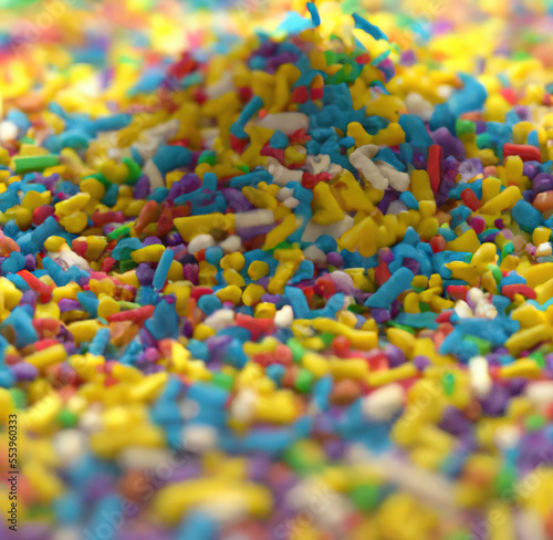 Close up of multiple colorful sweet sprinkles over blurred background created using Generative AI technology