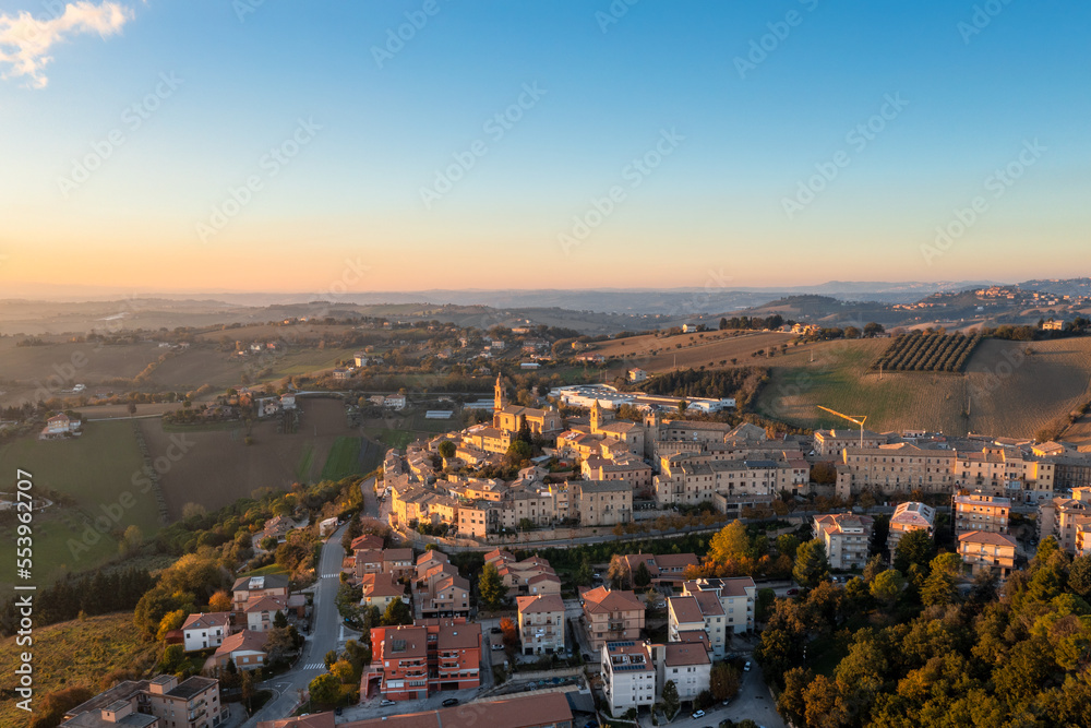 view of the village of Morrovalle in Marche Province in Italy in warm evening light