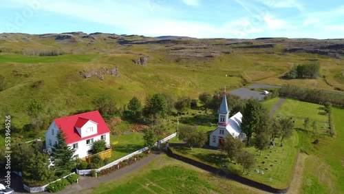 Aerial drone shot of houses and farmland in the Iceland Iglesia.  photo