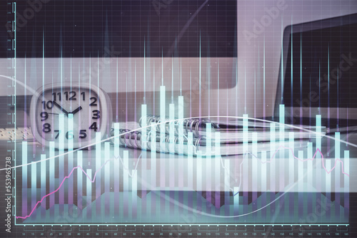 Forex Chart hologram on table with computer background. Double exposure. Concept of financial markets. © peshkova