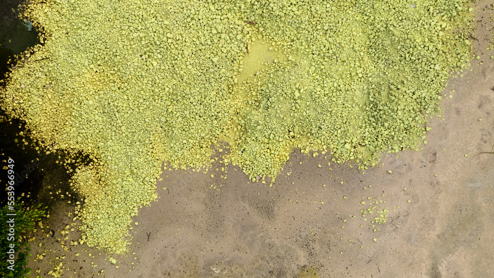 Chemical toxic waste from factory industry. Yellow sulphur powder