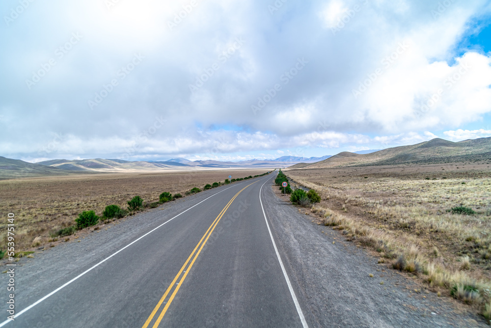 asphalt road in the Andes mountains in the nature of South America