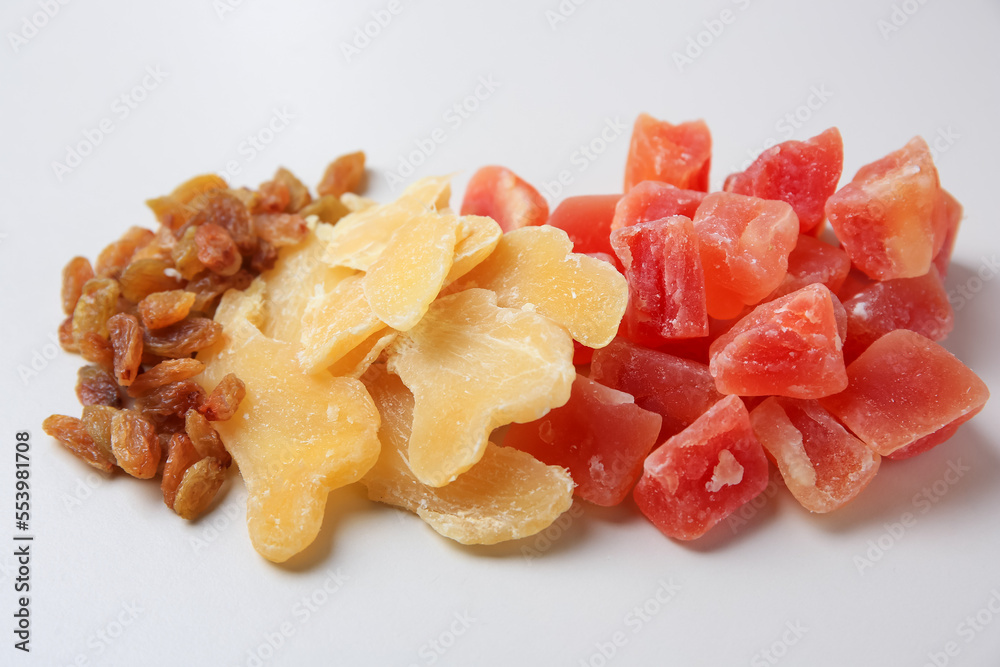 Pile of different dried fruits on white background Pile of different dried fruits on white background