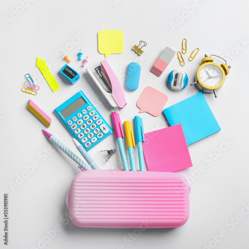 Flat lay composition with school stationery on white background